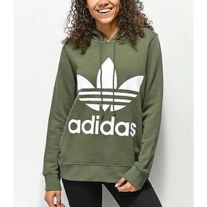 Women’s Adidas hooded sweatshirt with pockets and logo on front. Size S.